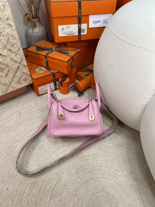 3ca0eca6fd0acbf-jpg-1 New Arrival Hermes Clemence Leather X9 Mauve Sylvestre Mini Lindy 19CM Gold Hardware