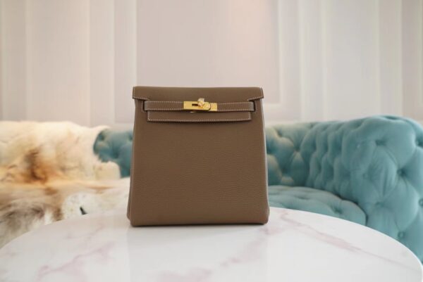 46199e67414dd4c-1 New God Factory Bags Hermes C18 Gris Etoupe Clemence Leather Kelly Ado Backpack22cm Gold Hardware