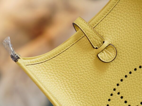 5d65a4226f566fe New Arrival Hermes 0Y Lemoncello Clemence Leather Evelyne Mini 16CM
