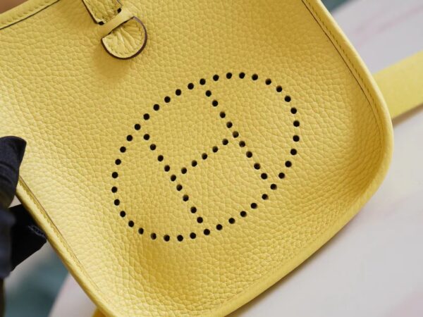 72f9e1f8f25ab65 New Arrival Hermes 0Y Lemoncello Clemence Leather Evelyne Mini 16CM