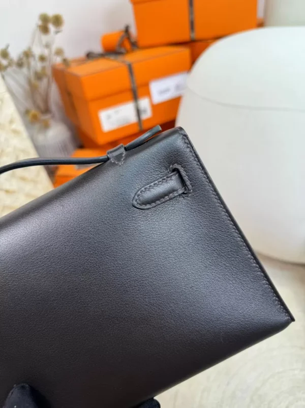 80074e54ac6e414-jpg Hot Sale Kelly Pochette 22cm 46 Ebene Swift Leather Silver Hardware
