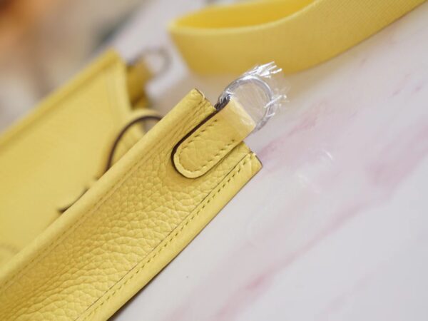 813443f6ab72dc0 New Arrival Hermes 0Y Lemoncello Clemence Leather Evelyne Mini 16CM