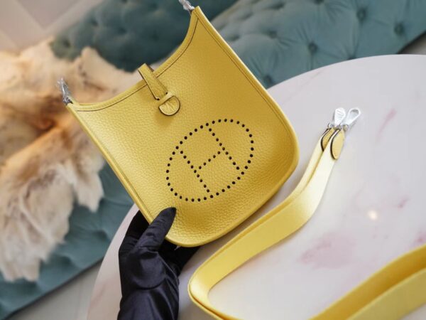 8d3496f02379b6c-1 New Arrival Hermes 0Y Lemoncello Clemence Leather Evelyne Mini 16CM