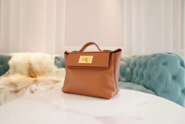 a4e6796a99b00f2 Hermes Boutique Mini Kelly 24/24 CK37 Gold Evercolor Leather Women’s Bag