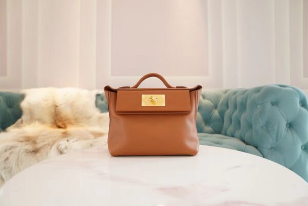 a918dd4c101a152-1 Hermes Boutique Mini Kelly 24/24 CK37 Gold Evercolor Leather Women’s Bag