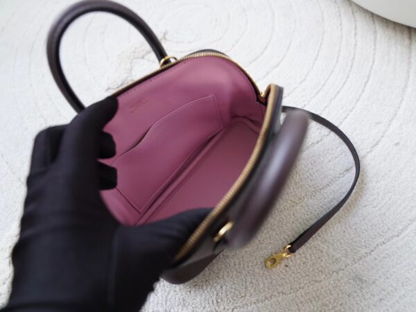 mmexport1720777297705 Hermes Mini Bolide 18CM Evercolor Leather 0G Rouge Sellier / X9 Mauve Sylvestre