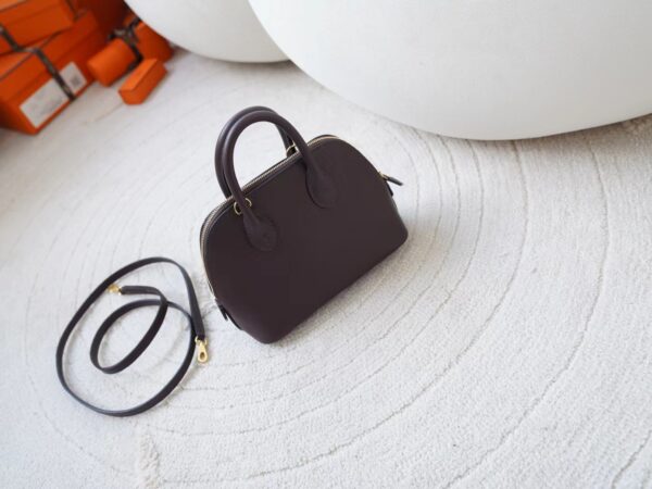 mmexport1720777299750 Hermes Mini Bolide 18CM Evercolor Leather 0G Rouge Sellier / X9 Mauve Sylvestre