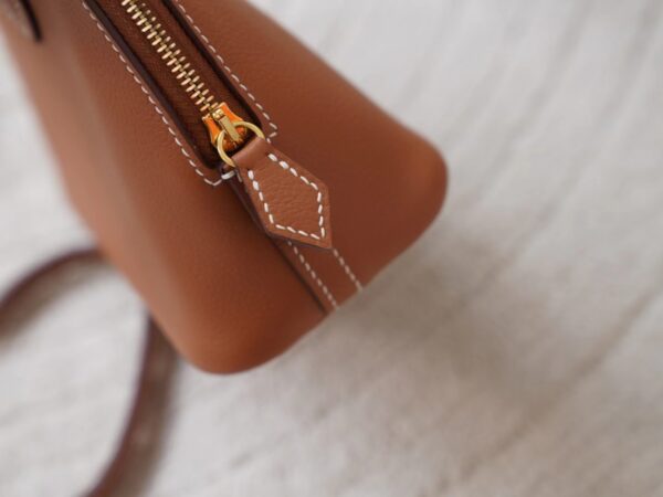 mmexport1721716444690 Hermes Bag Price Mini Bolide 18CM 37 Gold Evercolor Gold Hardware
