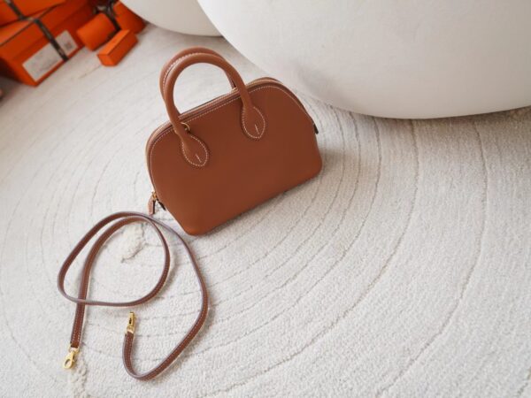 mmexport1721716454891 Hermes Bag Price Mini Bolide 18CM 37 Gold Evercolor Gold Hardware