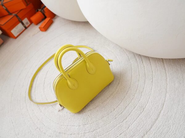 mmexport1721716512079 UK London Hermes 9R Lime Chevre Leather Mini Bolide 18CM Silver Hardware