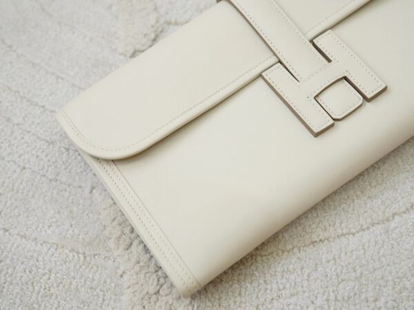 mmexport1722590359801 Hermes Swift Leather Jige Elan Clutch 10 Craie Women’s Clutch Bag
