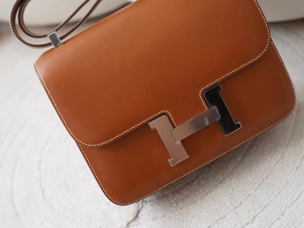 mmexport1726210407930 UAE Dubai Hermes CK37 Gold Barenia Leather Constance 24CM Silver Hardware