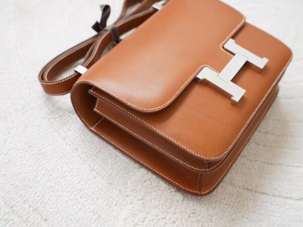 mmexport1726210411625 UAE Dubai Hermes CK37 Gold Barenia Leather Constance 24CM Silver Hardware