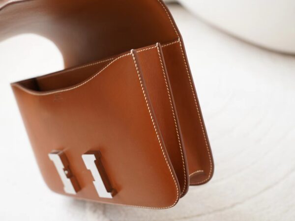 mmexport1726210415244 UAE Dubai Hermes CK37 Gold Barenia Leather Constance 24CM Silver Hardware