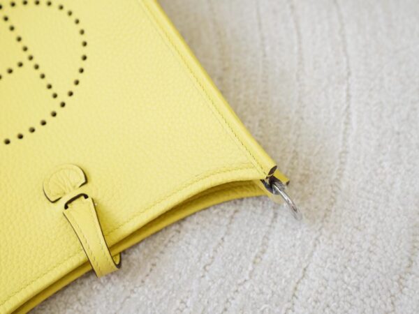 mmexport1726644624875 New Arrival Hermes Mini Evelyne 16CM Clemence Leather 0Y Lemoncello Silver Hardware