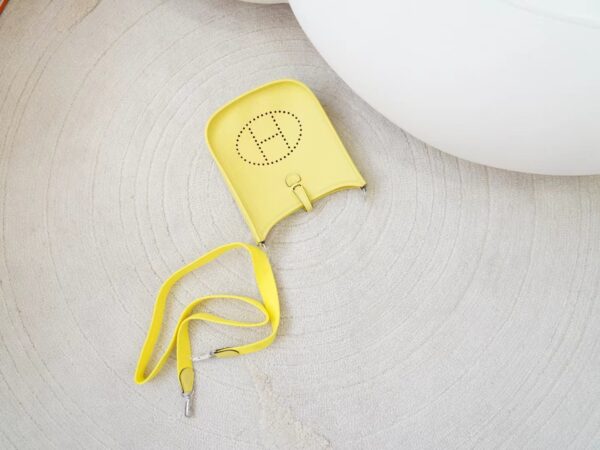mmexport1726644627094 New Arrival Hermes Mini Evelyne 16CM Clemence Leather 0Y Lemoncello Silver Hardware