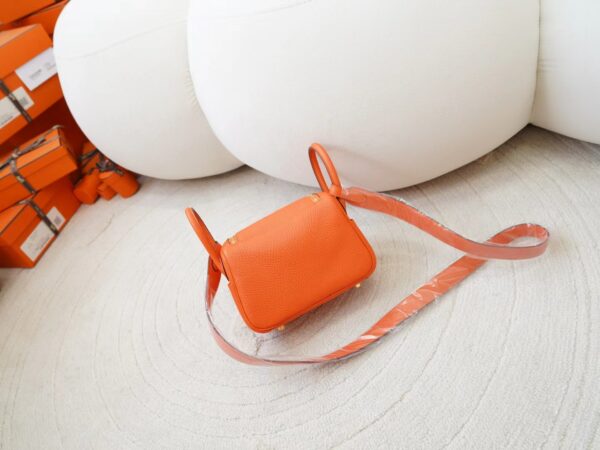 mmexport1726644681553 Hermes Bag Price Mini Lindy 19CM 9J Feu Orange Clemence Leather Gold Hardware