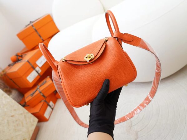 mmexport1726644693317 Hermes Bag Price Mini Lindy 19CM 9J Feu Orange Clemence Leather Gold Hardware