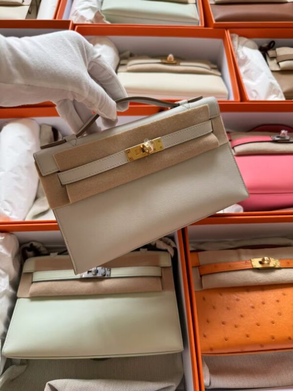 mmexport1730185265858-1 Hermes Kelly Pochette 22CM Swift Leather M4 Gris Pale Gold Hardware