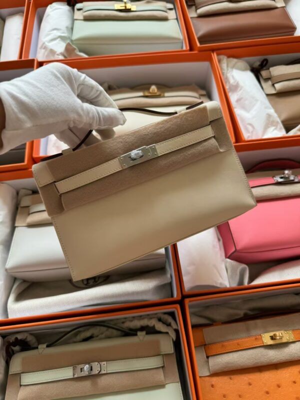 mmexport1730185269429 USA New York Hermes Kelly Pochette 22CM Swift Leather I2 Nata Silver Hardware