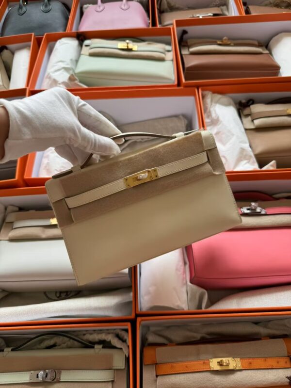 mmexport1730185272773-1 Hong Kong Hermes Kelly Pochette 22CM Swift Leather CC10 Craie Gold Hardware