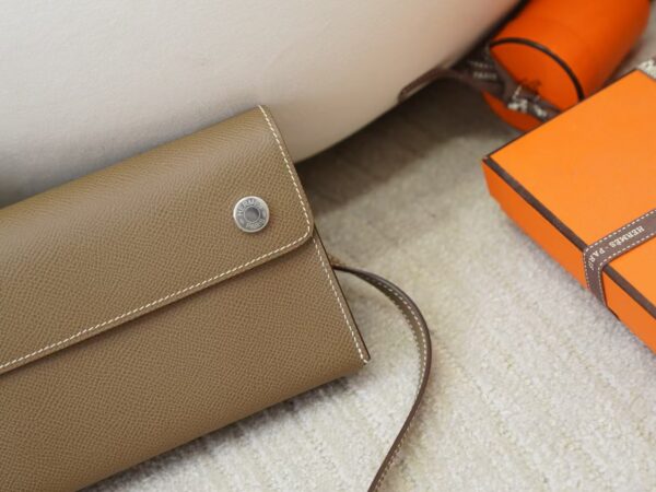mmexport1732175697212 Canada Ottawa Snap Wallet Epsom Leather CK18 Etoupe Silver Hardware