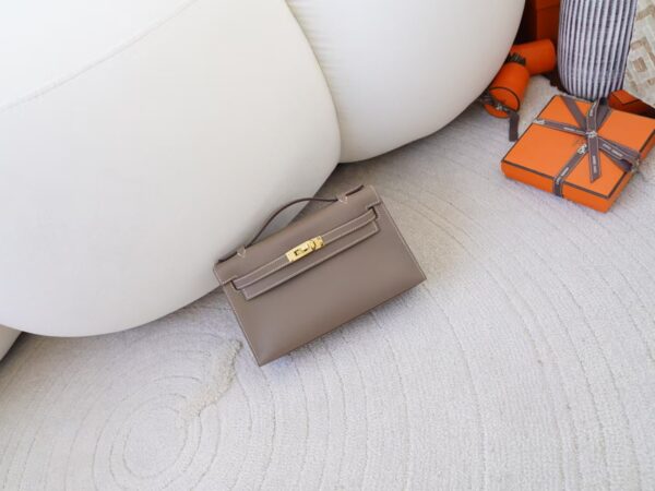 mmexport1732865835856-1 Women’s Clutch Bag CC18 Etoupe Swift Leather Kelly Pochette 22CM Gold Hardware
