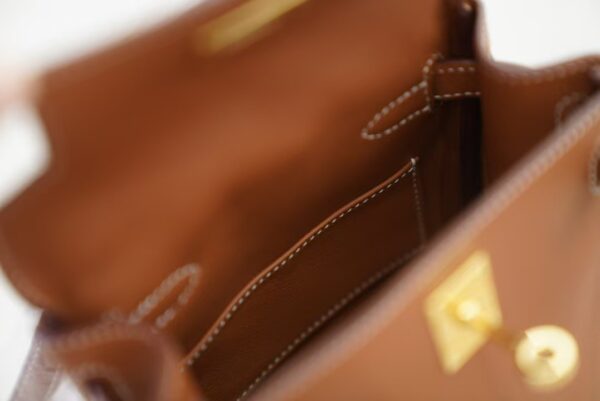 mmexport1733390171785 2025 New CC37 Gold Swift Leather Kelly Jump Backpack Gold Hardware