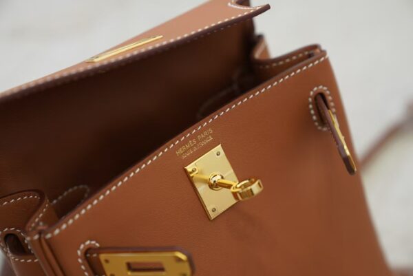 mmexport1733390173611 2025 New CC37 Gold Swift Leather Kelly Jump Backpack Gold Hardware