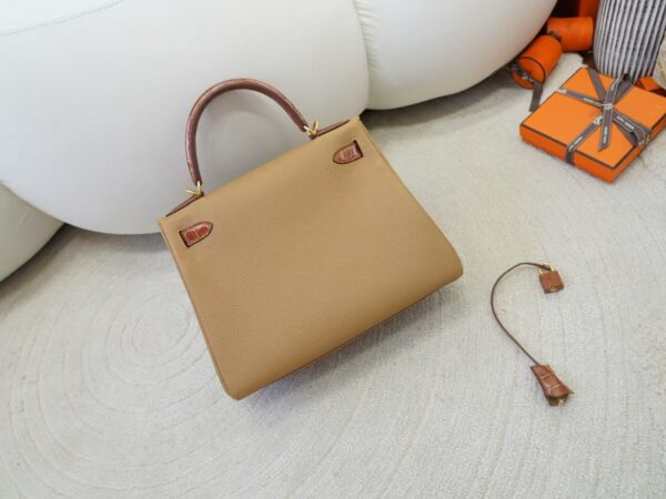 mmexport1733561182975 Special Order Kelly Touch 28CM Togo 0M Chai / Miel Shiny Crocodile Gold Hardware