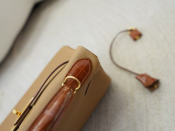 mmexport1733561194401 Special Order Kelly Touch 28CM Togo 0M Chai / Miel Shiny Crocodile Gold Hardware