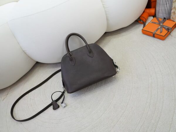mmexport1733993969163 UK London Bolide 25CM Barenia Leather 46 Ebene Silver Hardware