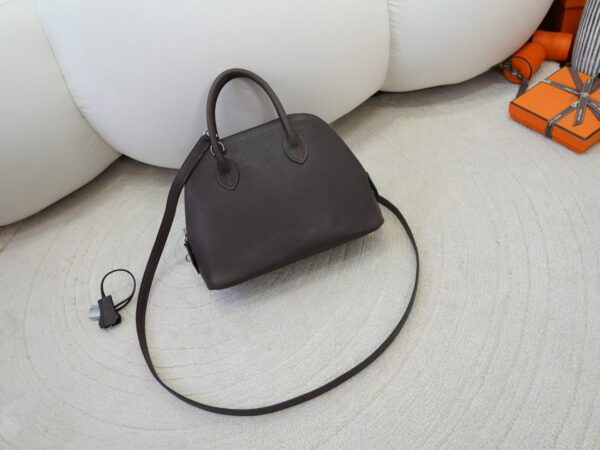 mmexport1733993972690 UK London Bolide 25CM Barenia Leather 46 Ebene Silver Hardware