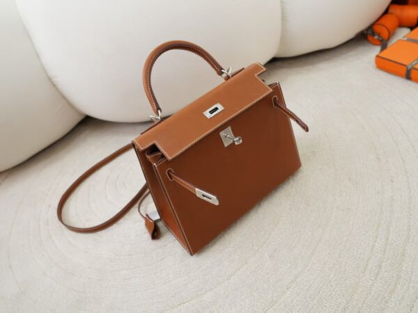 mmexport1734075600679 Australia Sydney Hermes Kelly 25CM Barenia Leather CK34 Fauve Silver Hardware