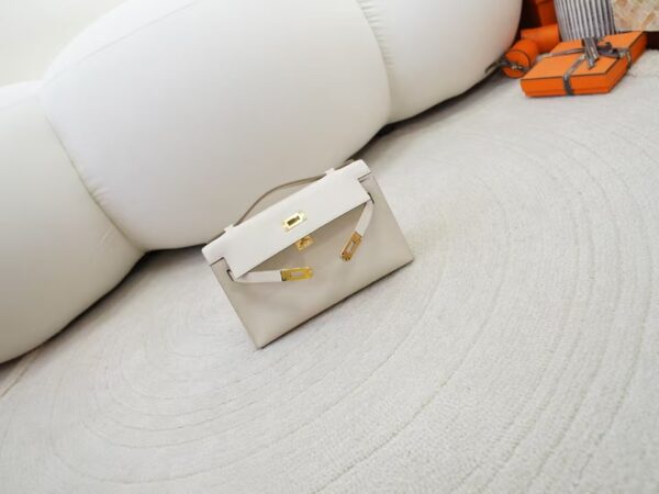 mmexport1734507649476 USA New York Kelly Pochette 22CM Swift Leather CC10 Craie Gold Hardware