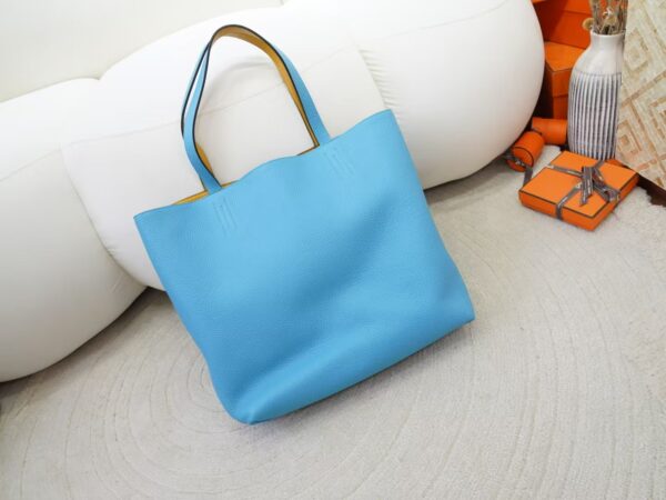 mmexport1734508280924 2024 New Hermes Double Sense Tote Bag Clemence Leather 7N Celeste / Amber