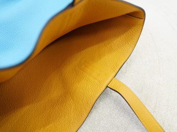 mmexport1734508291497 2024 New Hermes Double Sense Tote Bag Clemence Leather 7N Celeste / Amber