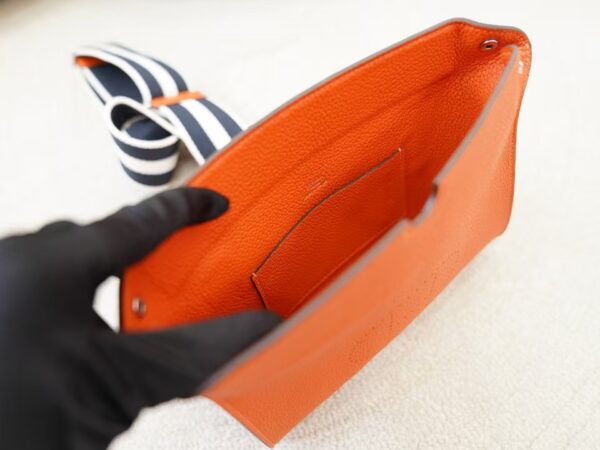mmexport1735374488384 Hermes Shoulder Bag Videpoches Togo Leather CK93 Orange Silver Hardware