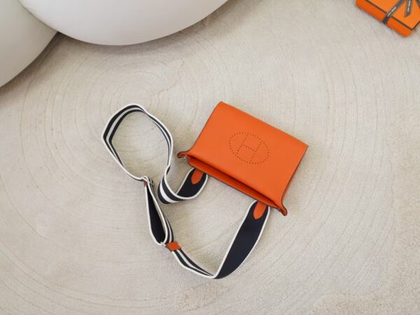 mmexport1735374492709 Hermes Shoulder Bag Videpoches Togo Leather CK93 Orange Silver Hardware