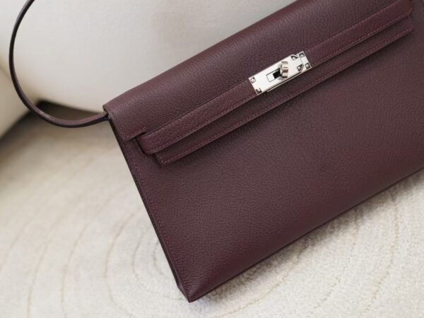 mmexport1744095304306 Hermes Kelly Elan Chevre Leather 0G Rouge Sellier Shoulder Bag Silver Hardware