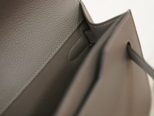 mmexport1744095364740 UK London Hermes Togo Leather 0W Gris Neve Kelly Depeches 25CM Clutch Bag Silver Hardware