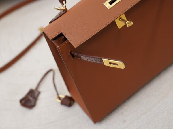 mmexport1744614986032 Hermes Kelly 25CM Touch 37 Gold Madame Leather / 33 Miel Shiny Crocodile Gold Hardware