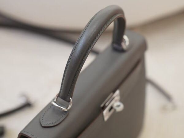 mmexport1744615062295 UK London Hermes 0L Gris Meyer Madame Leather Kelly 25CM Sellier Silver Hardware